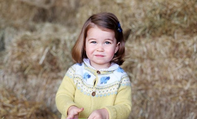 FILE PHOTO - Britain's Princess Charlotte is seen in this undated handout photograph, taken at Anmer Hall in Norfolk, and released by Prince Willam and Catherine, Duchess of Cambridge in London on May 1, 2017. Catherine, Duchess of Cambridge/Kensington Pa