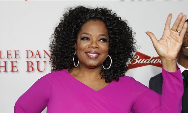 Actress Oprah Winfrey, a cast member of the film "Lee Daniels' The Butler", poses at the film's premiere in Los Angeles August 12, 2013. REUTERS/Fred Prouser