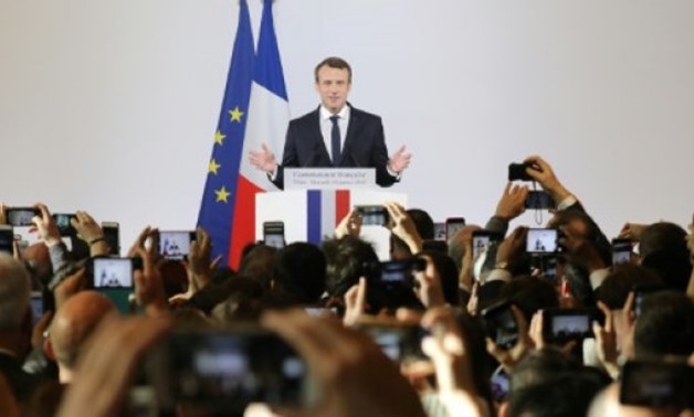 AFP / by Laurence BENHAMOU, Patrick BAERT | French President Emmanuel Macron Macron, who has become the leading voice of the European Union, endorsed President Xi Jinping's massive $1 trillion programme to revive ancient Silk Road trading routes during hi
