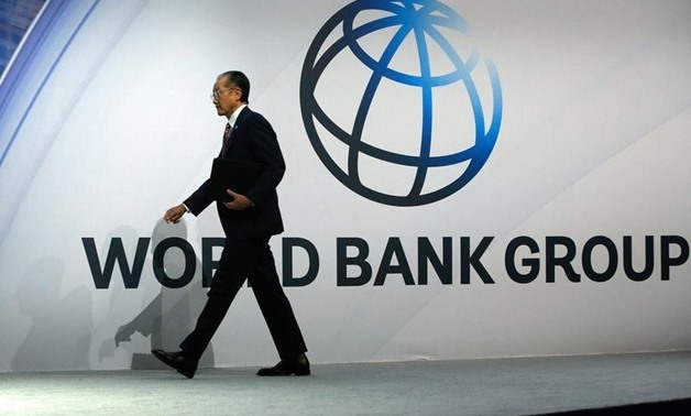 World Bank President Jim Yong Kim takes to the stage to deliver remarks at the plenary session at the IMF-World Bank annual meetings at Constitution Hall in Washington October 10, 2014. REUTERS/Jonathan Ernst