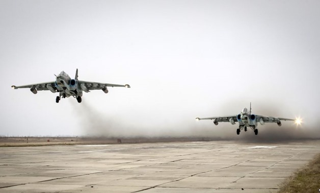 Sukhoi Su-25 jet fighters take off during a drill in Russia's Stavropol region, March 12, 2015. Russia plans to hold joint exercises with Belarus in September. REUTERS