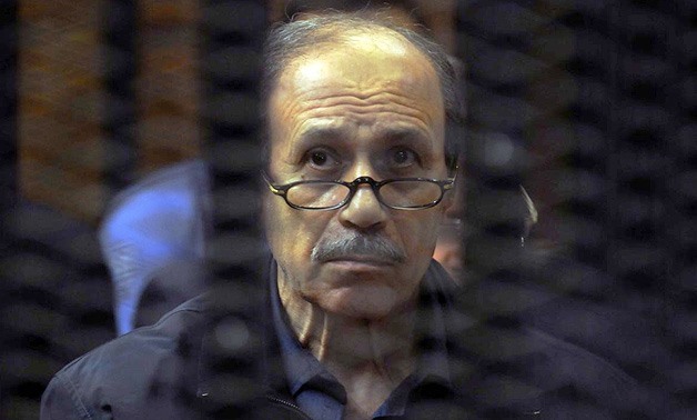 FILE –The former Interior Minister, Habib Al Adly in court accompanied by officers