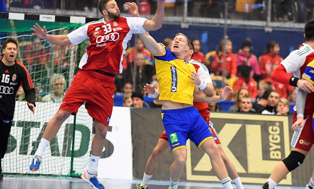 Handball - Sweden v Hungary - Kinnarps Arena, Jonkoping, Sweden - January 6, 2018 - Hungary's Gabor Ancsin and Sweden's Fredric Pettersson in action during a friendly game. TT News Agency/Mikael Fritzon via REUTERS ATTENTION EDITORS - THIS IMAGE WAS PROVI