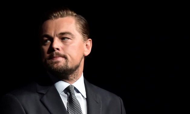FILE PHOTO: U.S. actor Leonardo DiCaprio looks on prior to speaking on stage during the Paris premiere of the documentary film "Before the Flood" at the Theatre du Chatelet in Paris, France on October 17, 2016. REUTERS/Christophe Archambault/Pool/File Pho