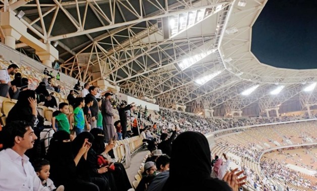 Saudi women watch the soccer match between Al-Ahli against Al-Batin at the King Abdullah Sports City in Jeddah, Saudi Arabia January 12, 2018. REUTERS/Reem Baeshen