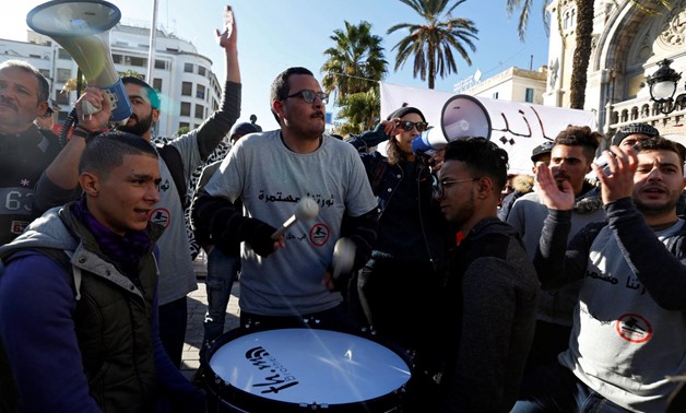A demonstrator hits a drum during protests against rising prices and tax increases in Tunis, Tunisia January 13, 2018. REUTERS/Zoubeir Souissi