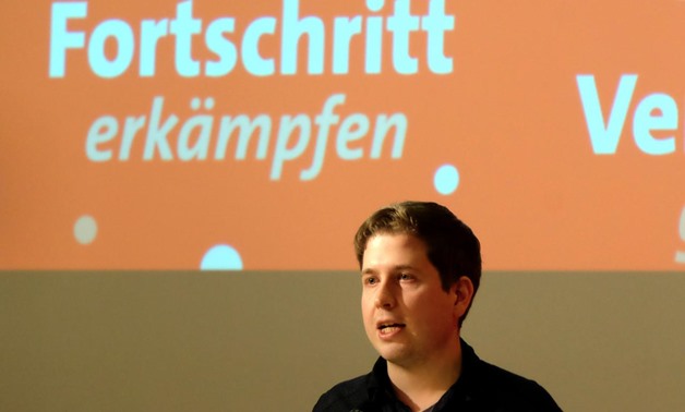 Kevin Kuehnert, head of the German Social DemocratsÕ (SPD) youth wing urges delegates to the partyÕs regional congress in the state of Saxony Anhalt not to back another four years of coalition with German Chancellor Angela Merkel during a meeting in Werni