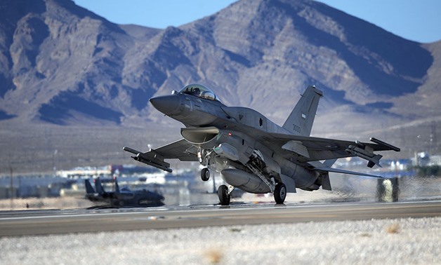 FILE - An F-16E from Al-Dhafra Air Base, United Arab Emirates, lands at Nellis Air Force Base - U. S. Air Force/ Michael R. Holzworth