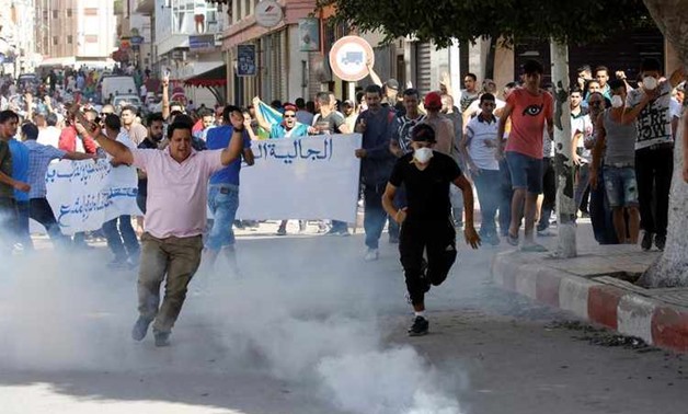 Police fire tear gas to disperse dozens of protesters in Tunis