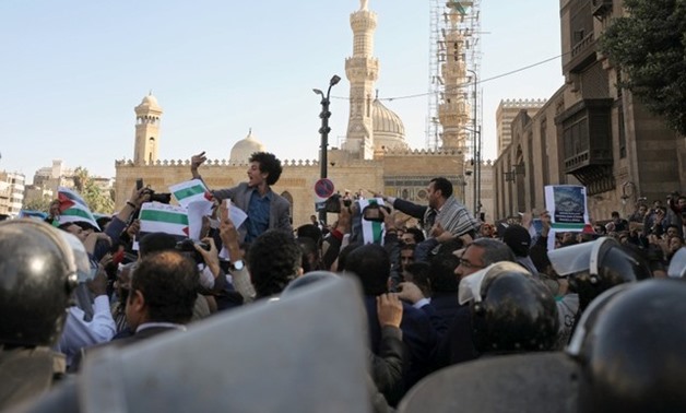 People chant slogans in front of al-Azhar mosque during a protest against Trump's Jerusalem declaration, in Old Cairo, Egypt December 8, 2017. Reuters