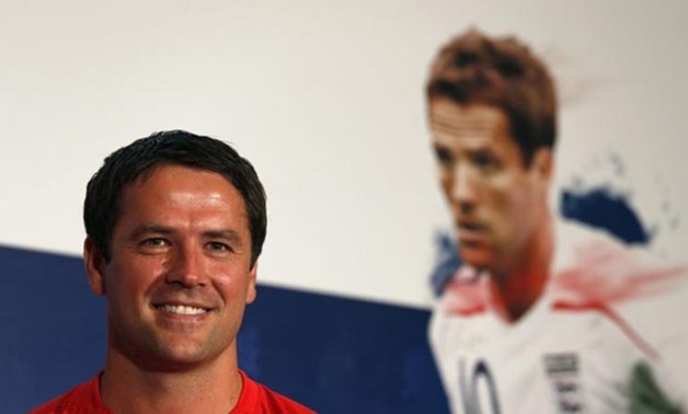 Former England national soccer team player Michael Owen attends a World Cup promotional event at a shopping mall in Hong Kong June 8, 2014. REUTERS/Bobby Yip 