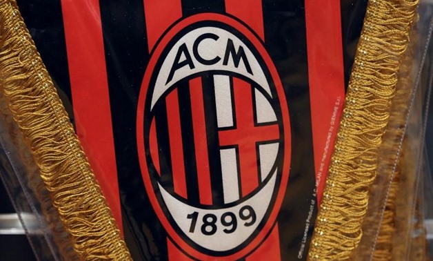 The AC Milan logo is pictured on a pennant in a soccer store in downtown Milan, Italy April 29, 2015. REUTERS/Stefano Rellandini/File Photo
