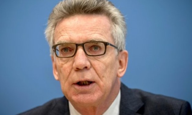 dpa/AFP | De Maiziere said German authorities have made significant progress in processing asylum requests.
