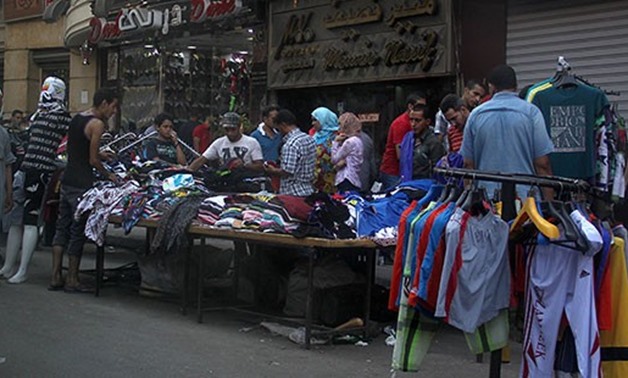 File - Street vendors occupying the streets in Cairo's downtown amid January 25 uprising before they were removed in 2015