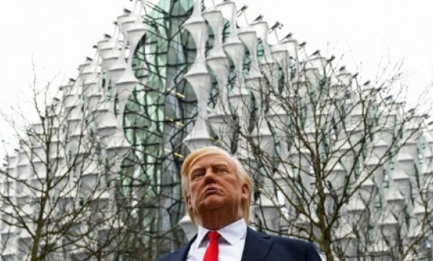 AFP / by Rosie SCAMMELL | Trump didn't go to London for the inauguration of the new US embassy, but there was a wax figure of him at the site