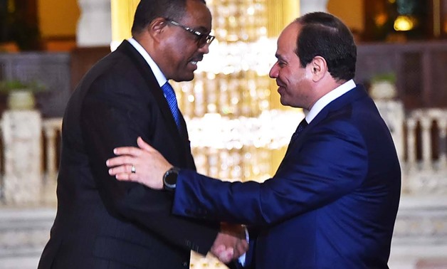 President Abdel Fatah al-Sisi (R) shake hands with Ethiopian Prime Minister Hailemariam Desalegn (L) during their meeting on Thursday, January 18, 2018 - Press photo