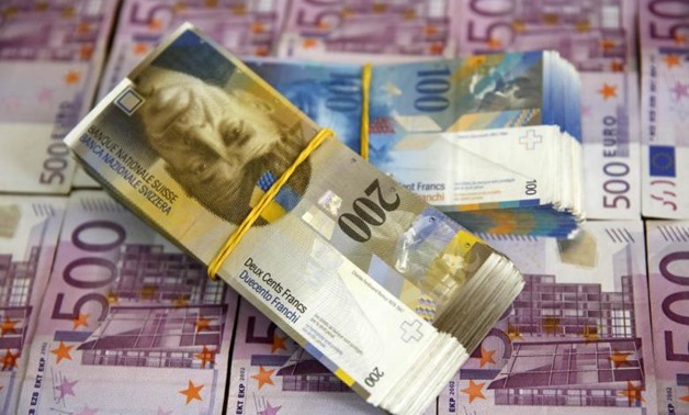 A picture illustration of Swiss Franc and Euro banknotes taken in central Bosnian town of Zenica - REUTERS
