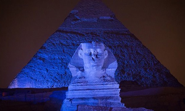 The Pyramids of Giza lit in blue for World Autism Awareness Day, April 2, 2017 - Youm7
