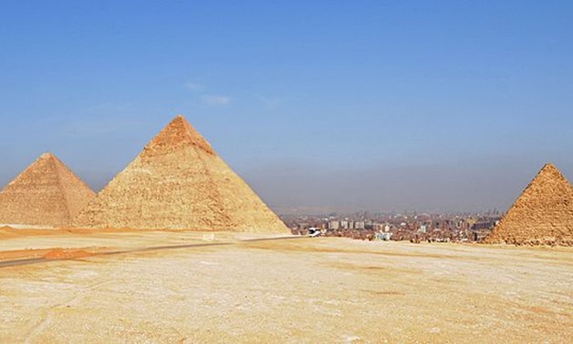 Pyramids of Giza, Egypt - Cairo skyline in the background March 2, 2010.- Wikimedia 