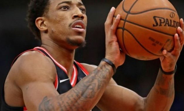 GETTY/AFP/File | DeMar DeRozan had 21 points, six assists and seven rebounds for the Raptors who improved to 31-13 with a win over the San Antonio Spurs