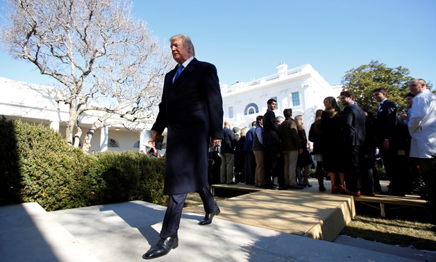 U.S. President Donald Trump leaves after addressing the annual March for Life rally, taking place on the National Mall, from the White House Rose Garden in Washington, U.S., January 19, 2018. REUTERS/Carlos Barria