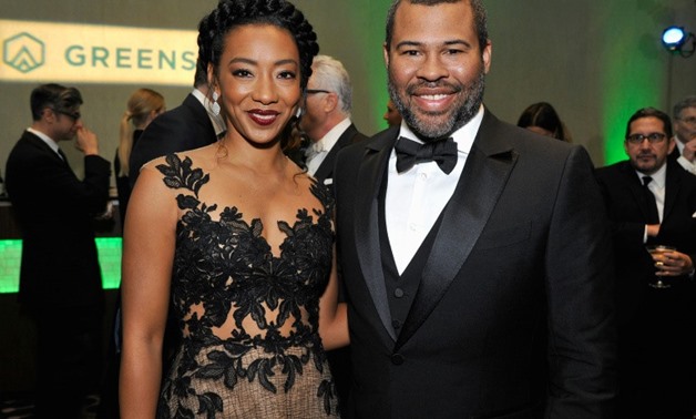 "Get Out" showrunner Jordan Peele, seen here with actress Betty Gabriel, was recognized for making a film that raises awareness of social issues and talked about "the sunken place," the term used for a brainwashed state that traps victims in his movie