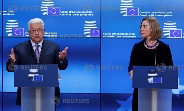 Palestinian President Mahmoud Abbas and European High Representative for Foreign Affairs Federica Mogherini give a press statement before a meeting with European Union foreign ministers in Brussels, Belgium, January 22, 2018. REUTERS/Yves Herman