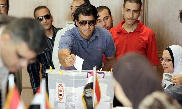 Egyptians living in Jordan cast their ballot in the early voting for the presidential elections on May 26-27, at the Egyptian embassy in Amman, on May 15, 2014 - AFP