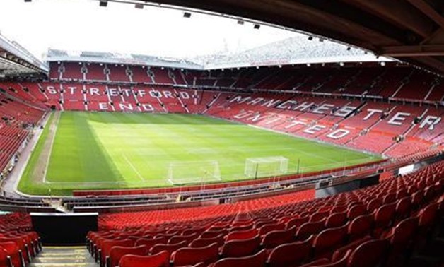 Manchester United's Old Trafford stadium is seen ahead of their English Premier League soccer match against Reading in Manchester, northern England March 16, 2013. REUTERS/Nigel Roddis
