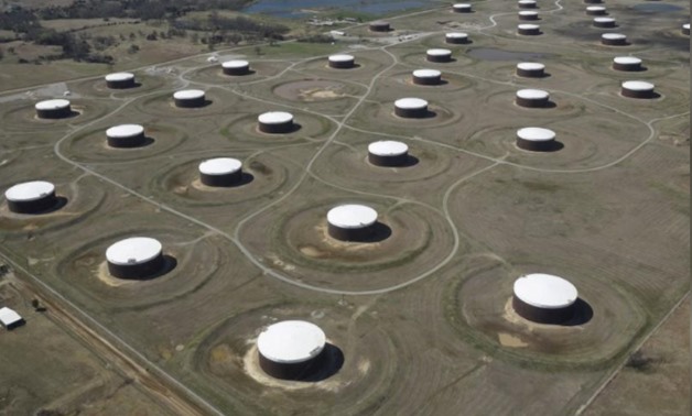 Crude oil storage tanks are seen from above at the Cushing oil hub, in Cushing, Oklahoma, March 24, 2016. REUTERS/Nick Oxford/File Photo
