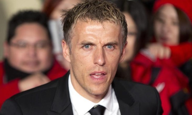 Soccer player Phil Neville attends the world premiere of the film "The Class of 92" in London December 1, 2013 - REUTERS/Neil Hall