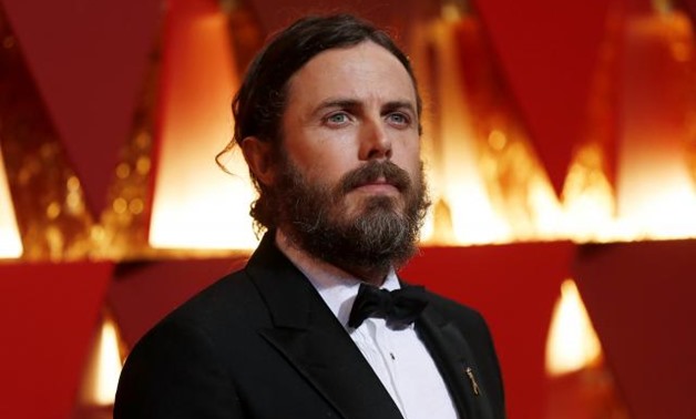 FILE PHOTO: Casey Affleck arrives for the 89th Academy Awards, Oscars Red Carpet in Hollywood, California, U.S. February 26, 2018. REUTERS/Mario Anzuoni/File Photo
