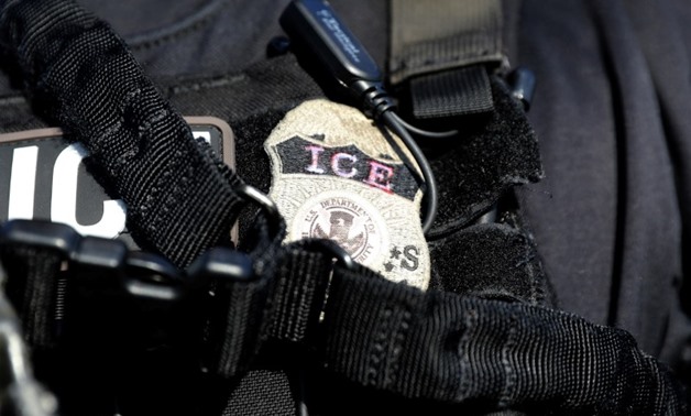 The badge of a U.S. Immigration and Customs Enforcement's (ICE) Fugitive Operations team is seen in Santa Ana, California, U.S., May 11, 2017. REUTERS/Lucy Nicholson
