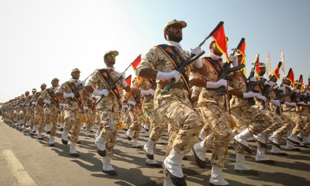 FILE PHOTO: Members of the Iranian revolutionary guard march during a parade to commemorate the anniversary of the Iran-Iraq war (1980-88), in Tehran, Iran, September 22, 2011 – REUTERS/Stringer/File Photo