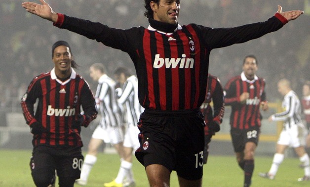 AC Milan's Alessandro Nesta celebrates after scoring against Juventus during their Serie A soccer match at Olympic stadium in Turin, January 10, 2010. REUTERS/Stefano Rellandini