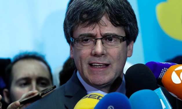 Former Catalan president Carles Puigdemont addresses the media after a meeting with Roger Torrent, speaker of Catalan Parliament, in Brussels, Belgium, January 24, 2018. REUTERS/Yves Herman