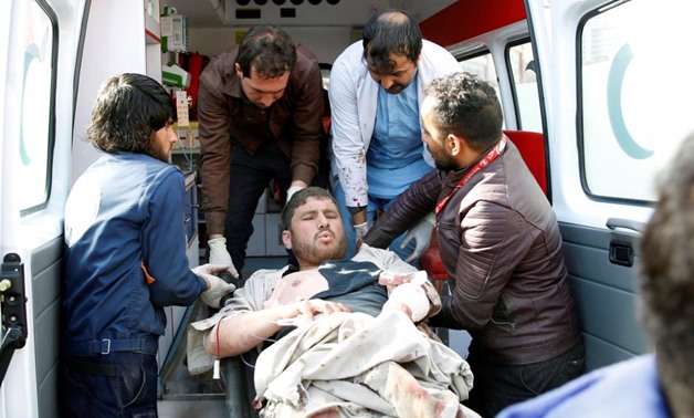 People carry an injured man to a hospital after a blast in Kabul, Afghanistan January 27, 2018.REUTERS/Mohammad Ismail
