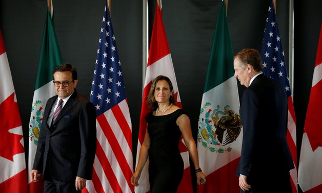 FILE PHOTO: Mexico's Economy Minister Ildefonso Guajardo (L-R), Canada's Foreign Minister Chrystia Freeland and U.S. Trade Representative Robert Lighthizer arrive for a trilateral meeting during the third round of NAFTA talks involving the United States, 