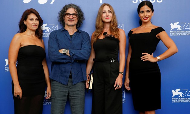 Director Ziad Doueiri (2nd L) poses with actors Rita Hayek (R), Christine Choueiri (L) and Diamand Bou Abboud during a photocall for the movie "The insult" - Reuters