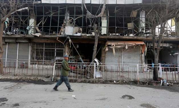 Afghan policemen inspect the site of a bomb attack in Kabul, Afghanistan, January 28, 2018. REUTERS/Omar Sobhani. “
