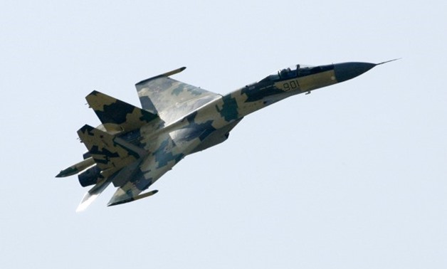 A SU-35 military jet performs during the opening of the MAKS-2009 international - Reuters
