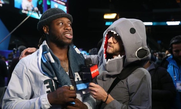 Jan 29, 2018; St. Paul, MN, USA; Philadelphia Eagles running back Jay Ajayi is interviewed by Rick Strom of TVT Sports during Super Bowl LII Opening Night at Xcel Energy Center. Mandatory Credit: Brace Hemmelgarn-USA TODAY Sports