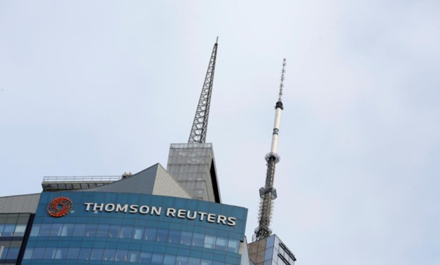 The Thomson Reuters logo is seen on the company building in Times Square, New York, U.S., January 30, 2018. REUTERS/Andrew Kelly