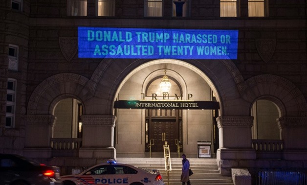 The latest projection by artist Robin Bell on the Trump International Hotel in Washington was timed to coincide with the president's State of the Union address
