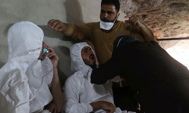 SUFFOCATING: Victims of a gas attack in the town of Khan Sheikhoun in rebel-held Idlib, Syria in April, 2017. REUTERS/Ammar Abdullah
