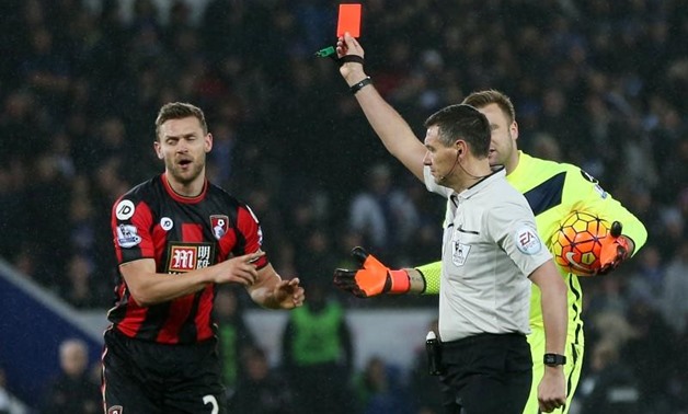 Referee Andre Marriner shows a red card to Bournemouth's Simon Francis Action Images via Reuters / Alex Morton Livepic
