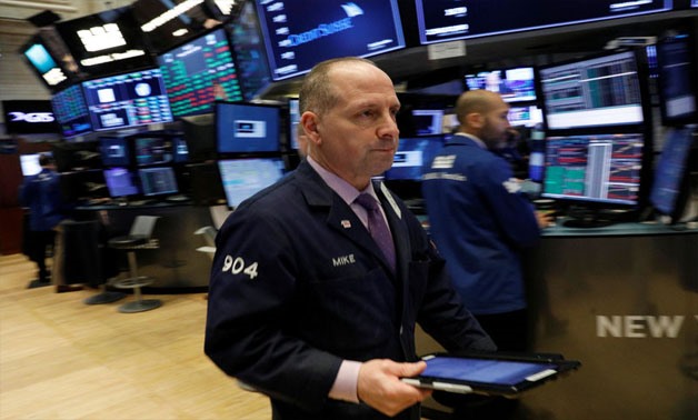Traders work on the floor of the New York Stock Exchange (NYSE) in New York, U.S., January 26, 2018 -
 REUTERS/Brendan McDermid