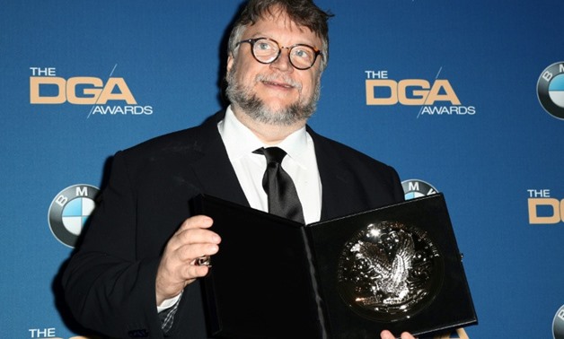 Director Guillermo del Toro was crowned best director for his Cold War-era fantasy romance "The Shape of Water"