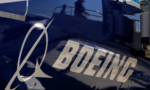 FILE PHOTO: The Boeing logo is seen on a Boeing 787 Dreamliner airplane in Long Beach, California March 14, 2012. REUTERS/Lucy Nicholson/File Photo
