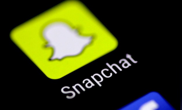FILE PHOTO: The Snapchat messaging application is seen on a phone screen August 3, 2017. REUTERS/Thomas White/File Photo
